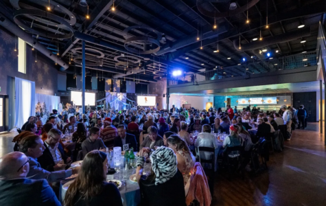 People fill a large event space